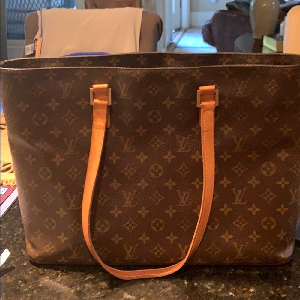 Louis. Vuitton large tote. 16 W by 12 L.